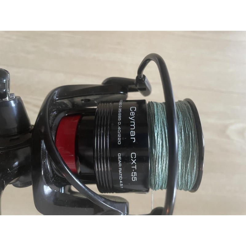 BLACK MAGIC & OKUMA - Ensemble Canne Black Widow Ext 31 lb (2 brins) 80-110G + Moulinet Okuma Ceymar CXT-55