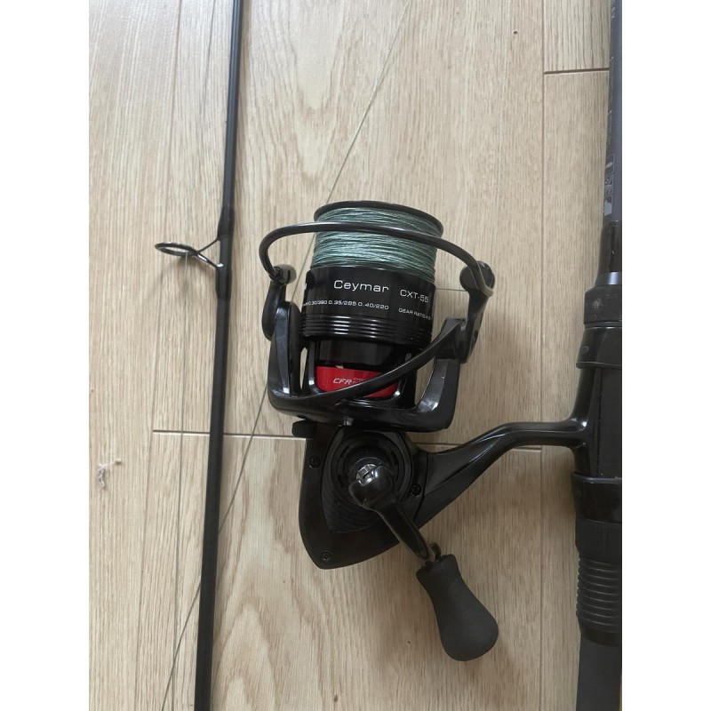 BLACK MAGIC & OKUMA - Ensemble Canne Black Widow Ext 31 lb (2 brins) 80-110G + Moulinet Okuma Ceymar CXT-55