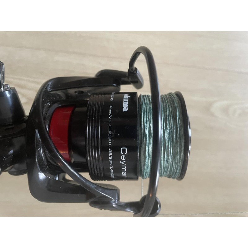 BLACK MAGIC & OKUMA - Ensemble Canne Black Widow Ext 31 lb (2 brins) 80-110G + Moulinet Okuma Ceymar CXT-55
