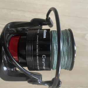 BLACK MAGIC & OKUMA - Ensemble Canne Black Widow Ext 31 lb (2 brins) 80-110G + Moulinet Okuma Ceymar CXT-55